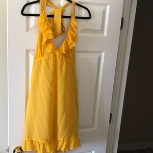 Betsey Johnson bright yellow halter dress.
